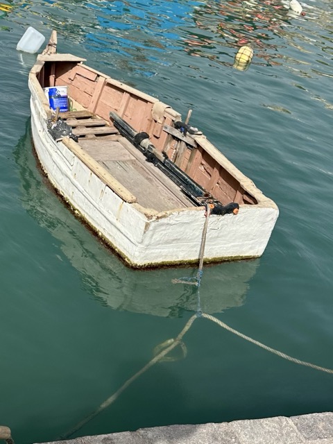A minimal rowboat is like a minimal container. Photo taken on the Isle of Malta, a historical shipping center.
